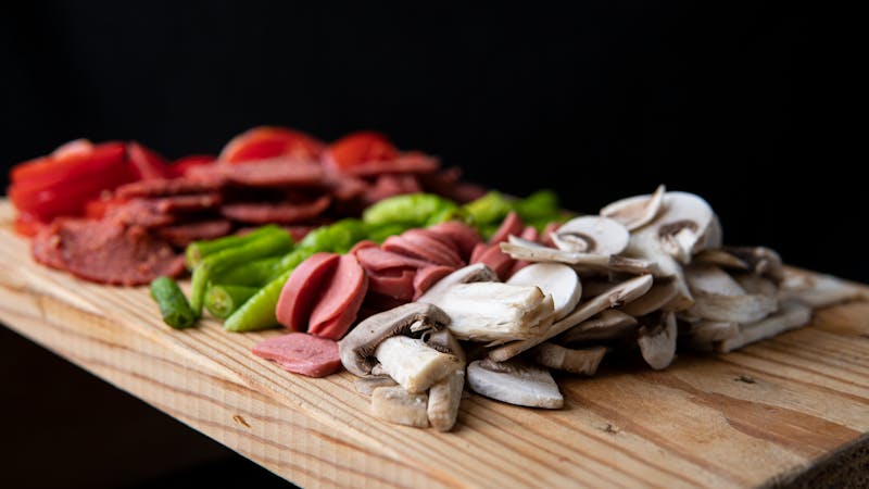 Detroit-style Cadillac pizza with sausage and mushrooms