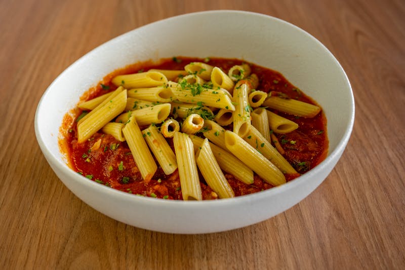 Pasta bowl with sausage and tomato sauce