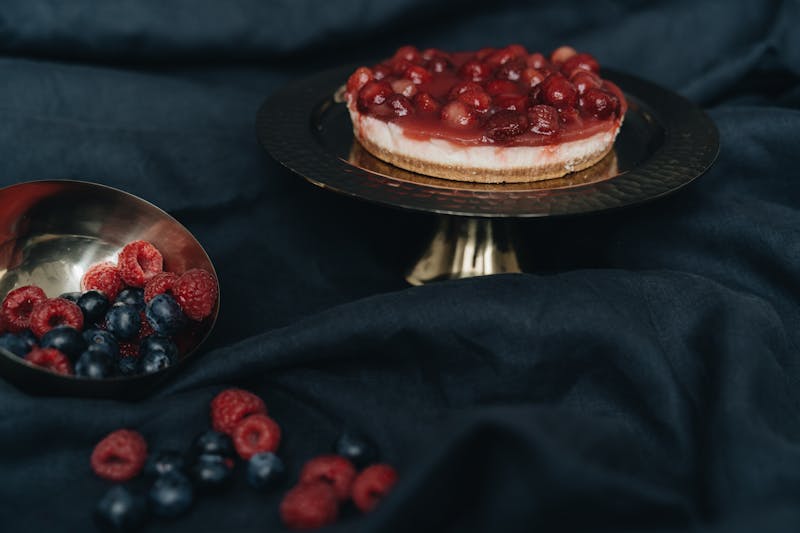 Creamy New York style cheesecake with berry compote